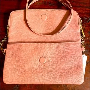 NWT. CHARMING CHARLIE purse cross body and can carry 2 ways